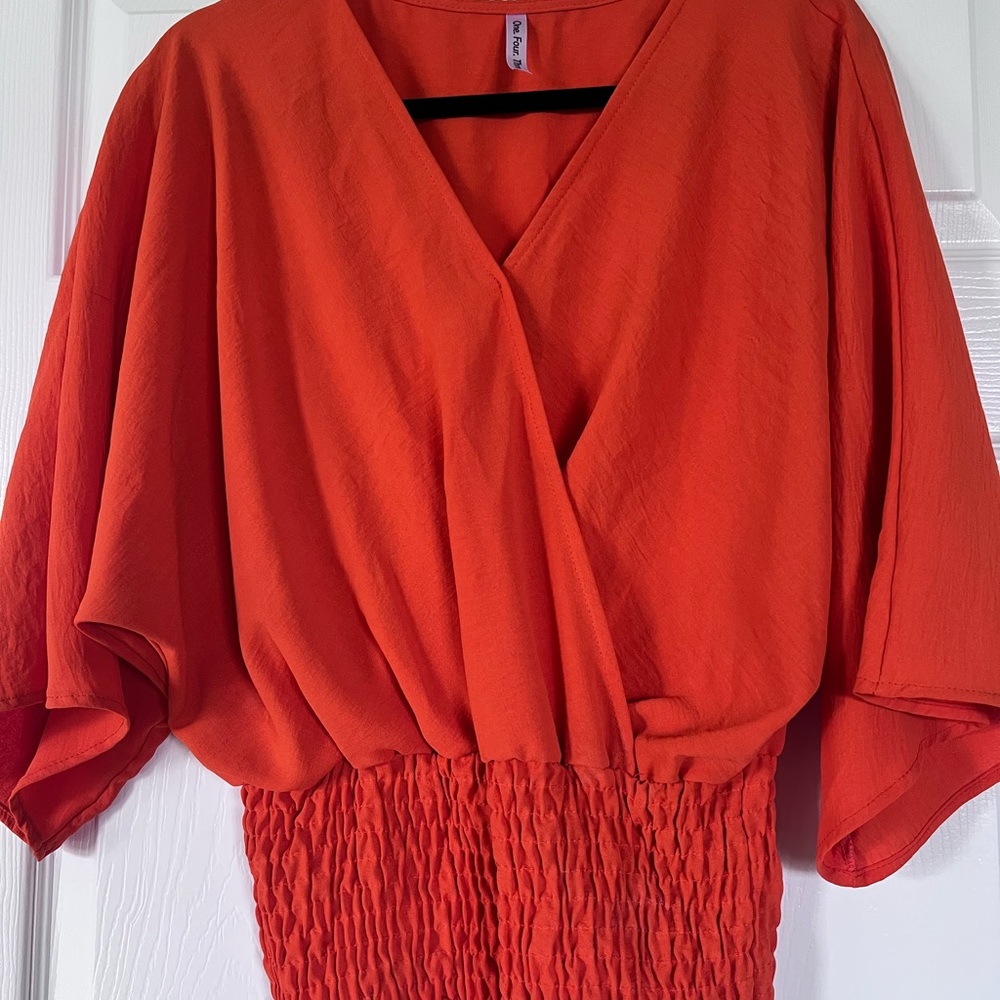 Bright Orange Wrap-Style Women's Top by One.Four.Three Boutique.